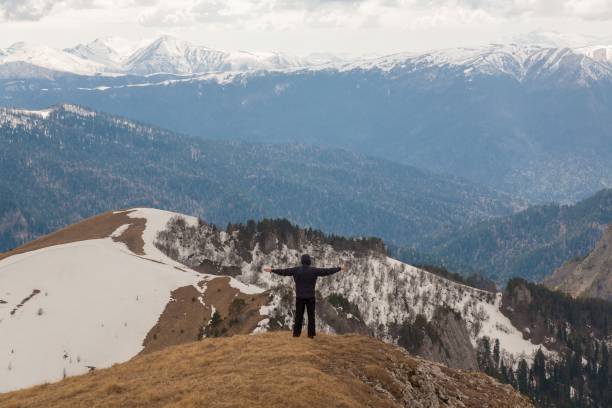 A man in mountain day winter. Unique