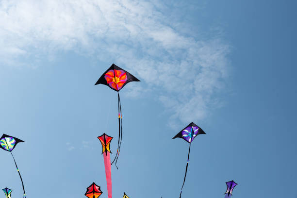 istock Kites with blue sky and white clouds 1131587674