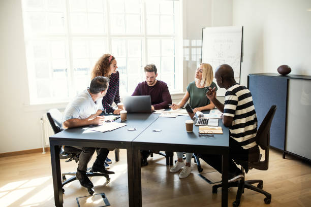 istock Designers working on a project together in an office 1131588863