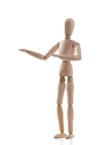 istock Wooden mannequin gesturing isolated on white background 1131590053