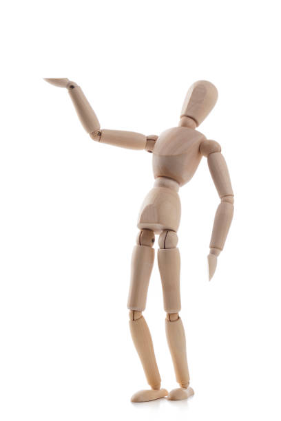 istock Wooden mannequin gesturing isolated on white background 1131590096