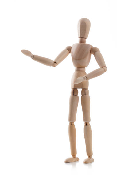 istock Wooden mannequin gesturing isolated on white background 1131590105