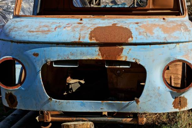 istock empty old blue rusty car cabin on the street 1131590324