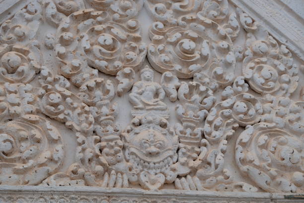 istock stone relief above ancient temple entrance, asia 1131594649