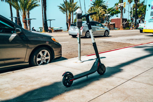 Bird Electric Ride Sharing Scooters in the sunny LA Los Angeles, USA - January 21, 2018: Bird Electric Ride Sharing Scooters in the sunny LA near Santa Monica. lime scooter stock pictures, royalty-free photos & images
