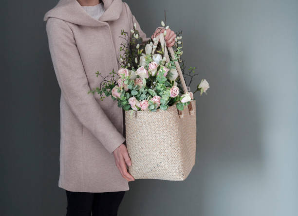 istock Basket with flowers and roses 1131599635