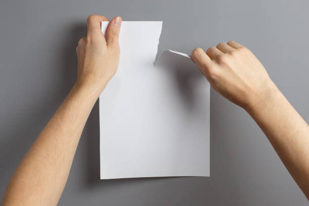 istock Hands tearing a paper 1131600807