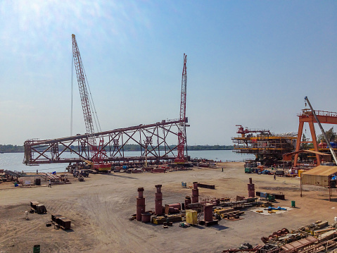 The jacket offshore platform ready on the barge for sail out to offshore and installation in oil and gas industry