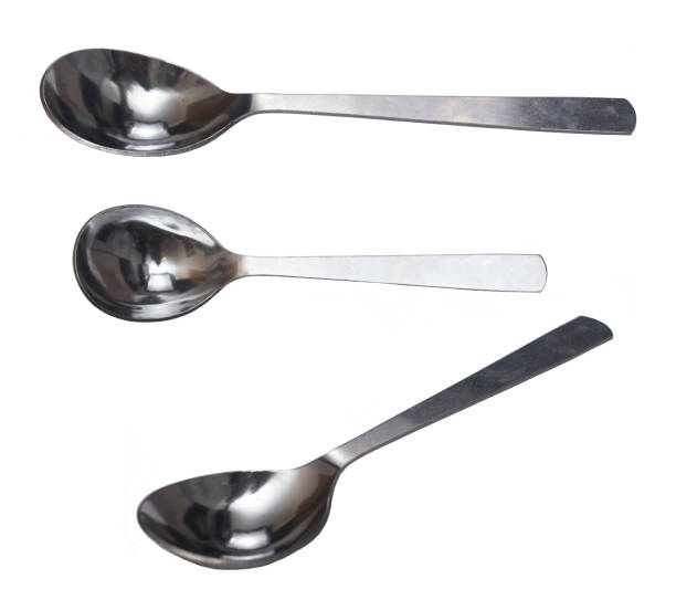 istock small tea stainless spoon isolated  closeup 1131607138