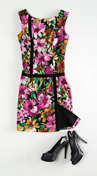 istock Floral pattern dress with high-heels isolated on white background 1131609029
