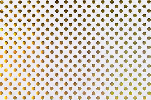 Polka dot gold foil golden color glitter decorative texture paper wrap: Bright brilliant festive metallic textured empty wallpaper backdrop: Tin metal material for holiday craft design decoration