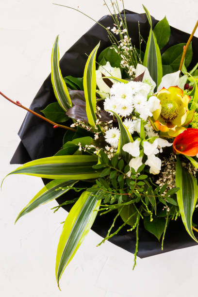 istock Flowers spring bouquet. Blue ceramic vase. White backround. 1131611044