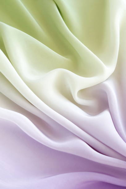 istock silk fabric background texture pastel  color top view. 1131614224