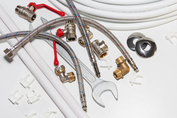 istock plumbing tools and equipment on white with copy space 1131617602