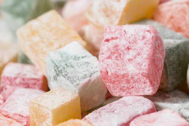 istock Pieces of multicolored Turkish Delight in powdered sugar. 1131620904