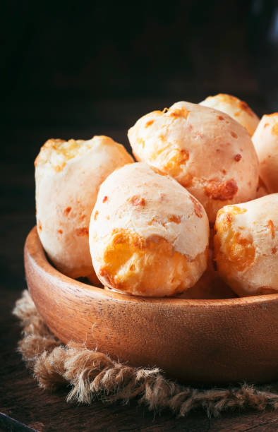 istock Homemade sweet custard buns, wooden bowl, rustic kitchen table, place for text, selective focus 1131621203