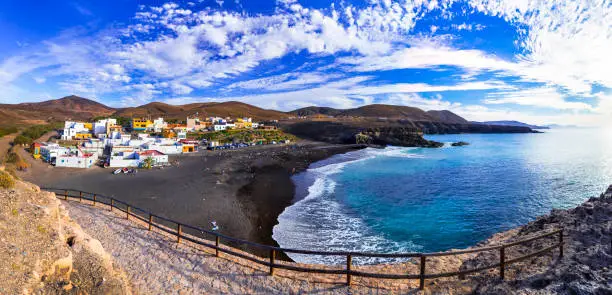 Photo of Fuerteventura - picturesque traditional fishing village Ajui, with black beach. Canary islands