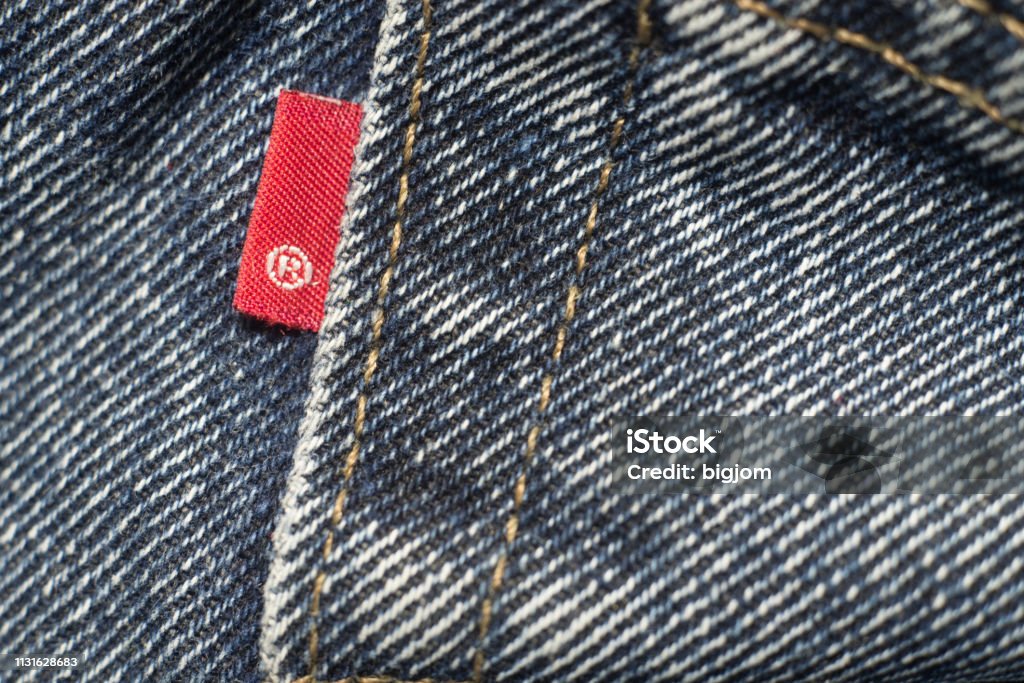 Closeup Detail Of Levis Red Tag On Levis Jeans Stock Photo - Download Image  Now - Jeans, Men, Adult - iStock