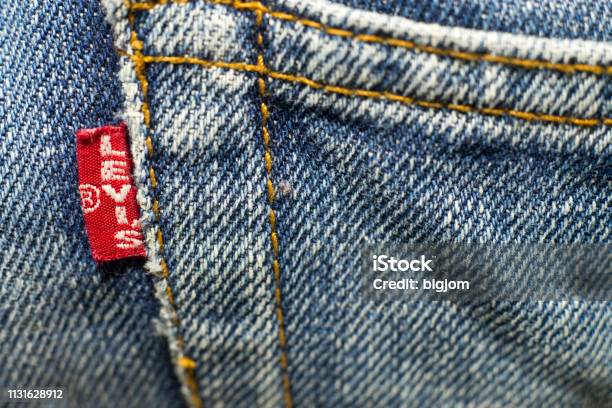 Closeup Detail Of Levis Red Tag On Levis Jeans Stock Photo - Download Image  Now - Jeans, Denim, Men - iStock