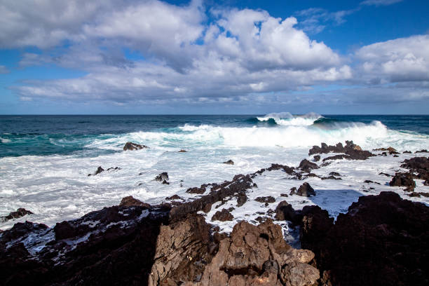 istock far view from waves at tenerife island 1131629458