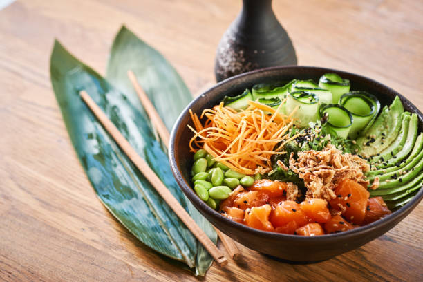 istock Poke bowl on wooden table 1131632161