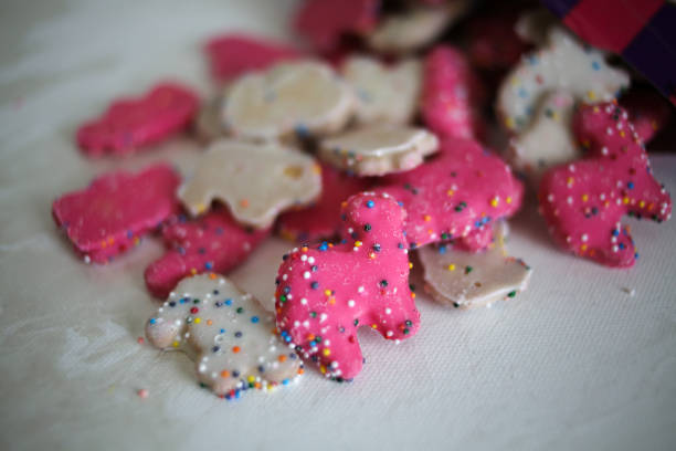 istock Frosted Circus Animal Cookie Pink and White Sprinkled Animal Crackers 1131632386