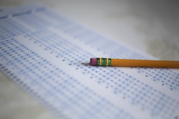 istock Back to School Concept Standardized Testing Yellow Number 2 Pencil on a Fillable Testing Form 1131632564