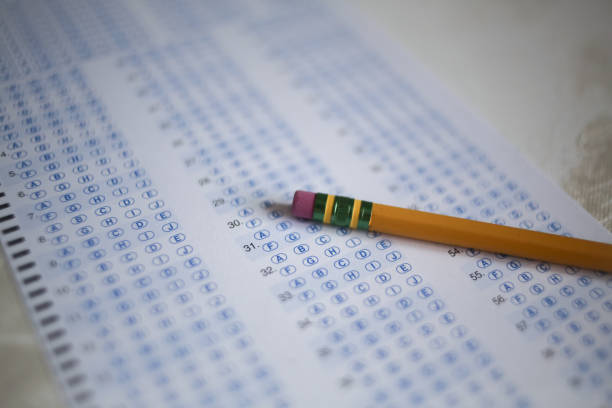 istock Back to School Concept Standardized Testing Yellow Number 2 Pencil on a Fillable Testing Form 1131632591