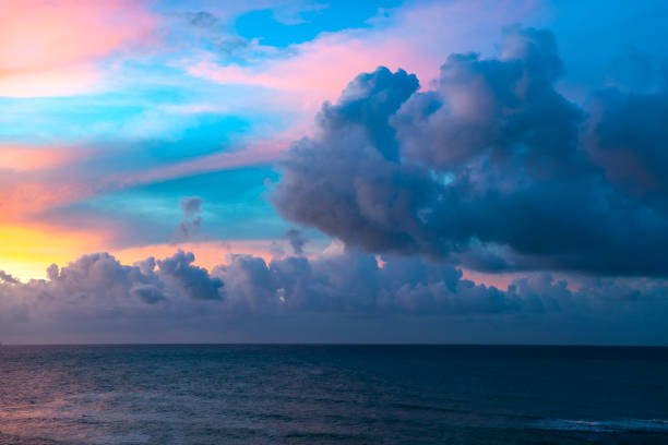 istock Twilight sunset over the sea with colorful clouds. Dramatic atmosphere created by the sunlight. 1131634288