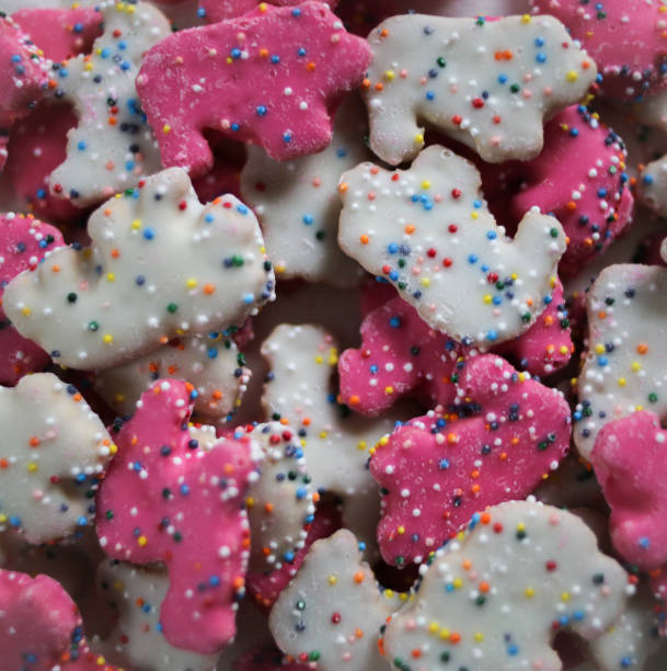 istock Frosted Circus Animal Cookie Pink and White Sprinkled Animal Crackers 1131634505