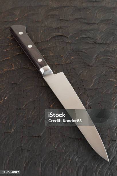Big Chef Knife On The Flat Lay Above Dark Blue Moody Background Stock Photo  - Download Image Now - iStock