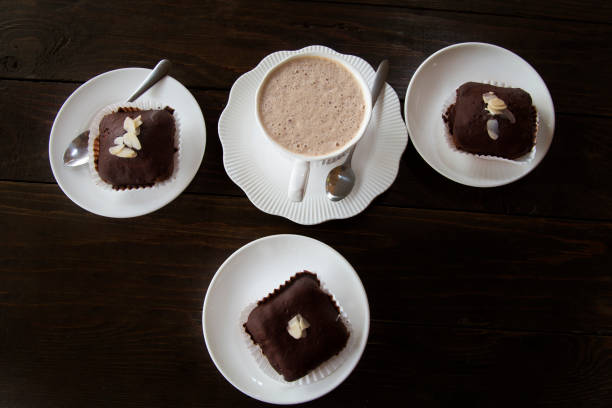 istock Coffee and cake Placed on a wooden table with a coffee spoon 1131635143