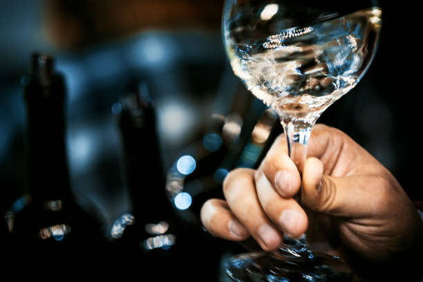 Man Swirling Wine Before Tasting Stock Photo - Download Image Now - White Wine, Sommelier, Wineglass - iStock Man Swirling Wine Before Tasting Stock Photo - Download Image Now - White Wine, Sommelier, Wineglass - iStock