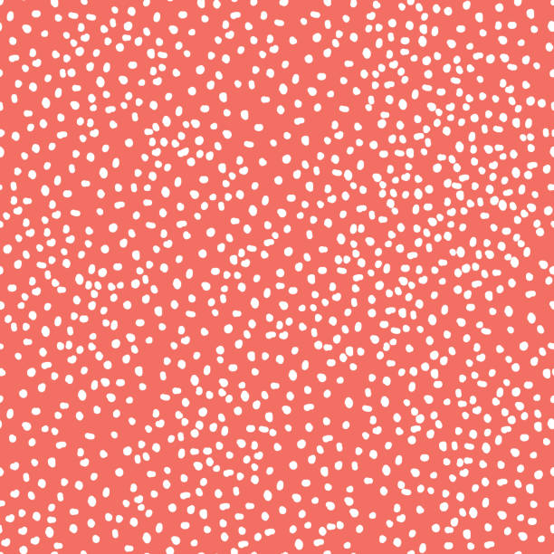 istock Seamless pattern background in trendy color of 2019, coral color, endless hand drawing abstract doodle of dust dots or circles, ovals, bubbles or snow, this year. Vector. 1131637765