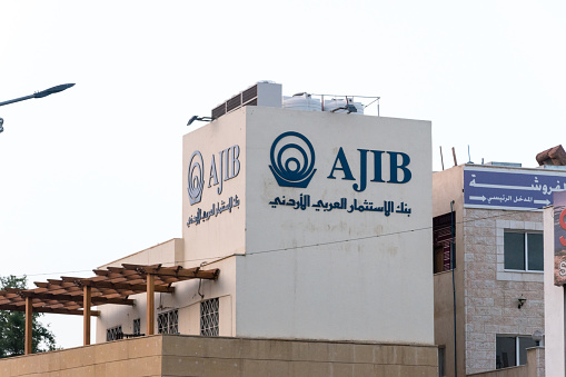 Aqaba, Jordan - February 8, 2019: Logo and sign of Arab Jordan Investment Bank.