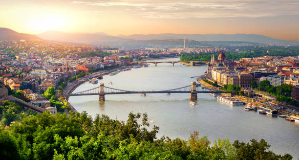 Panorama of summer Budapest Panoramic view of summer Budapest at sunset budapest photos stock pictures, royalty-free photos & images
