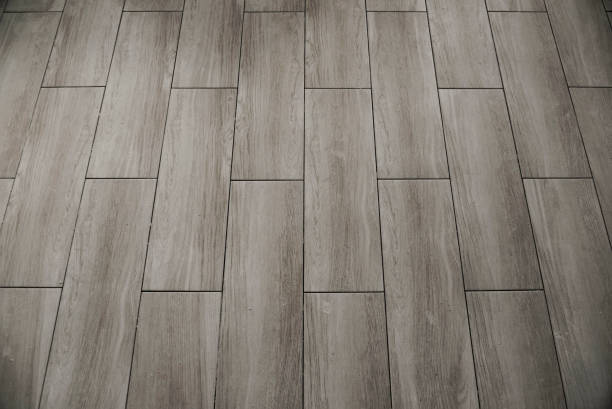 istock Grey wooden floor background 1131651097