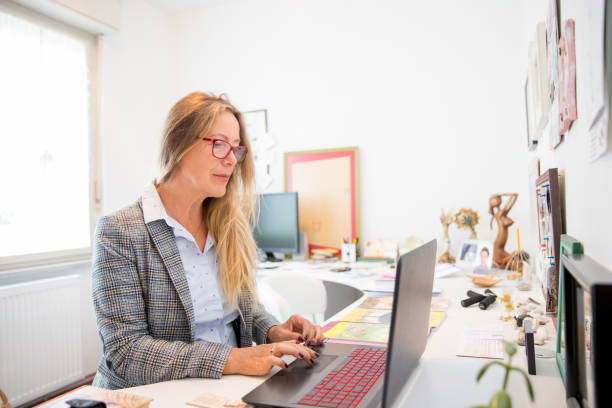 istock Businesswoman Working on Her Laptop 1131651353