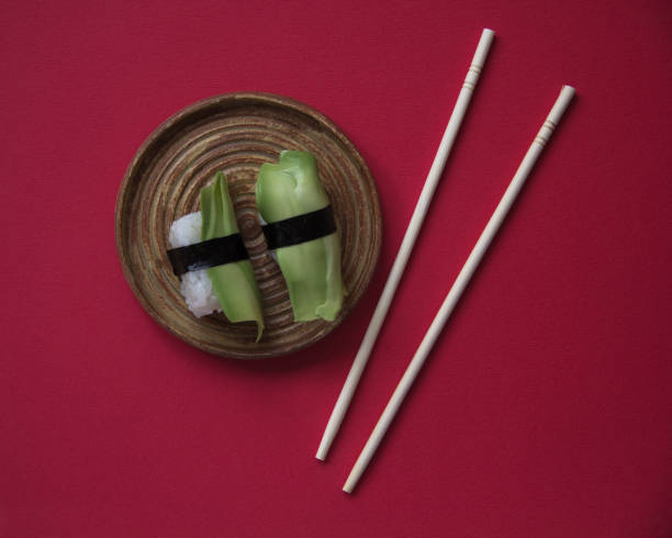 Avocado Sushi Isolated on Red Background, Japanese Food