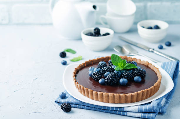 istock Chocolate tart with blackberries and blueberries 1131651722