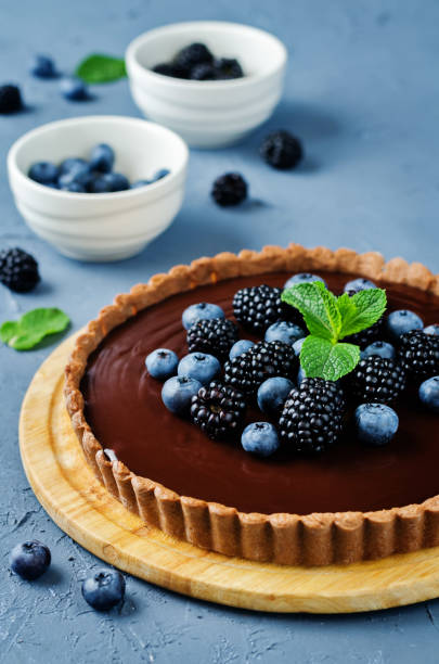 istock Chocolate tart with blackberries and blueberries 1131651733