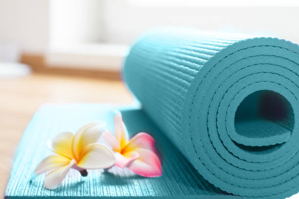 istock yoga mat on floor 1131657178
