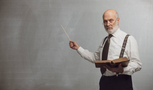 istock Senior academic professor giving a lecture 1131673440