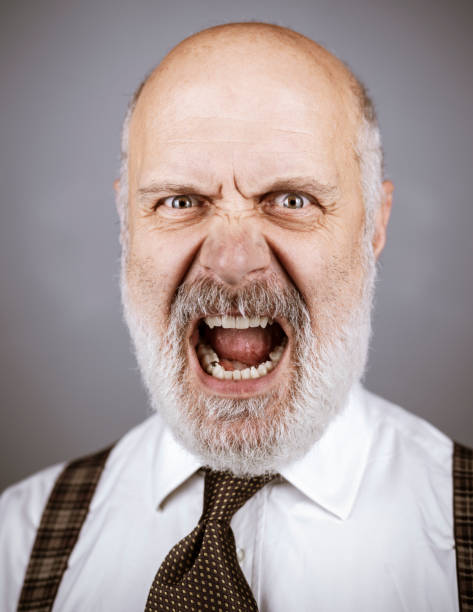 istock Angry mature man shouting at the camera 1131673545