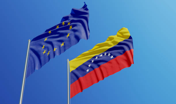 istock European Union and Venezuelan Flags Waving With Wind 1131675638