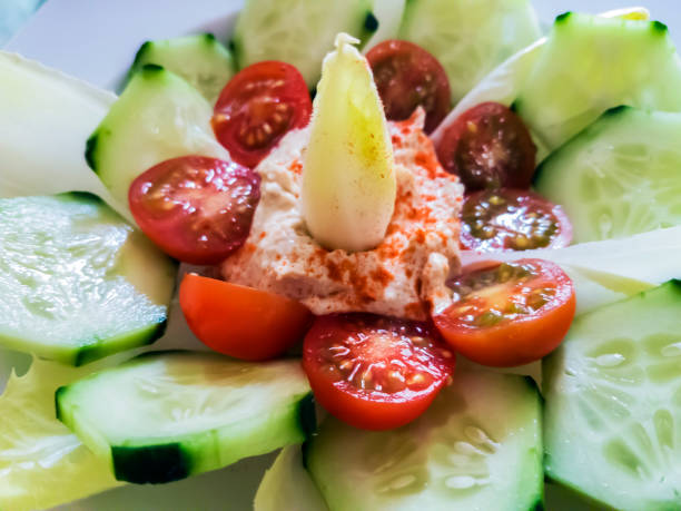 Salad with hummus, a healthy and tasty meal