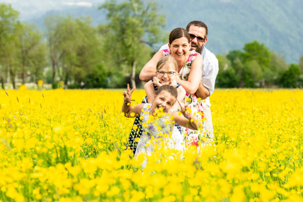 istock Happy family in a rapeseed field 1131678828
