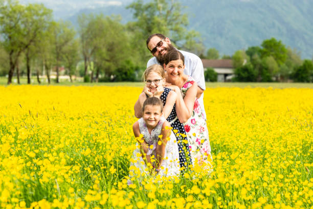 istock Happy family in a rapeseed field 1131678829