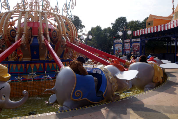 Tourists enjoy activities inside the Shanghai Disneyland , China. It is the first Disney park resort in mainland China