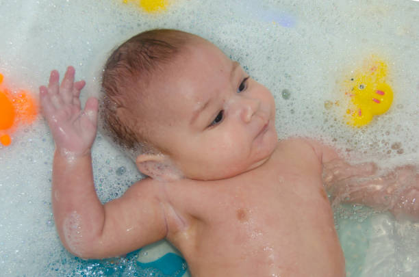 istock cute 4 months old baby boy having a bath with foam 1131682162